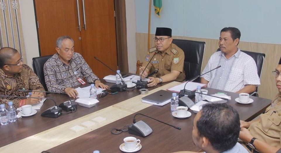 Usin. Rapat evaluasi Perda No 1 tahun 2014