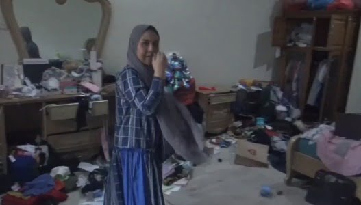 Korban saat berada di rumahnya