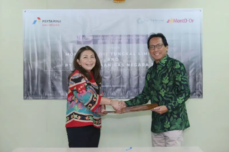 Penandatanganan Memorandum of Understanding (MOU) untuk kerja sama pemanfaatan WK Tungkal oleh Direktur Komersial PGN Ratih Esti Prihatini dan General Manager MOTL Hendra Jaya, pada Jumat (9/5/2025).