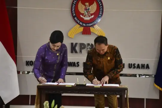 KPPU Gandeng OJK Hadapi Tantangan Transformasi Digital Sektor Keuangan